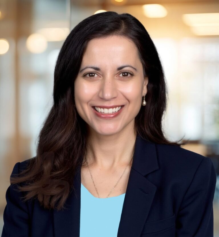 Headshot of Nil Loy, Chief Legal Officer for Feed the Children