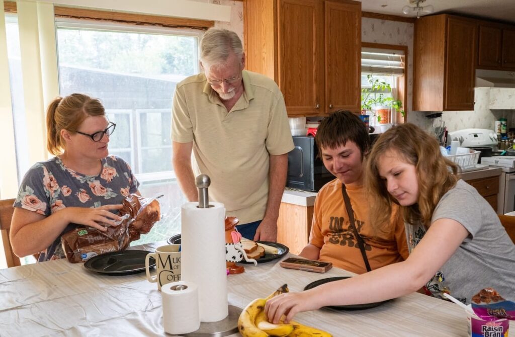 A family gathered around a table eating